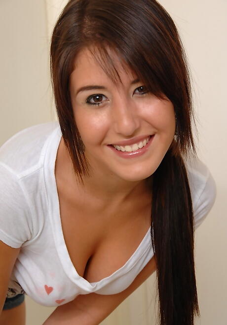 Slim american young Missi Daniels in shorts exhibiting her ass and jerking off 